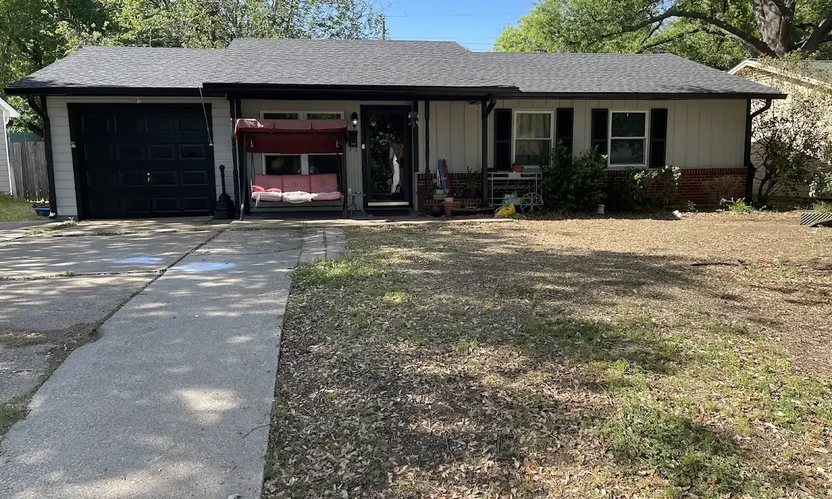 Asphalt Shingle Roof Repair crew at work on a residential roof in Weldon Spring
